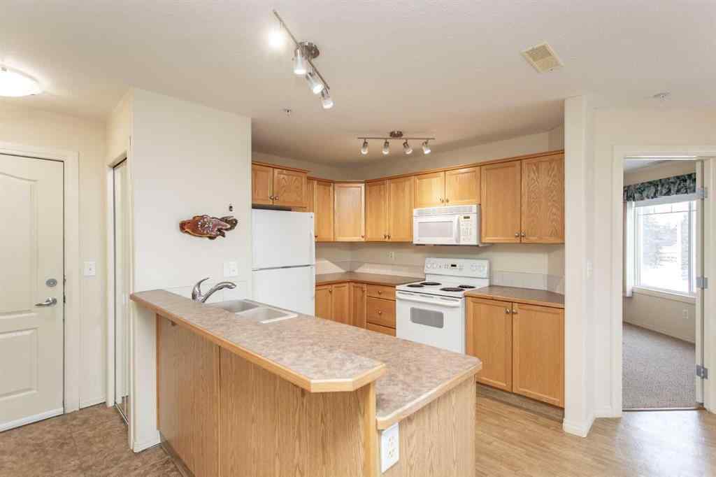 MLS® A2260347 - Unit #207 4425 Heritage Way   in Downtown Lacombe Lacombe, Residential