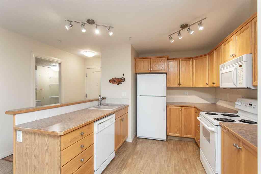 MLS® A2260347 - Unit #207 4425 Heritage Way   in Downtown Lacombe Lacombe, Residential