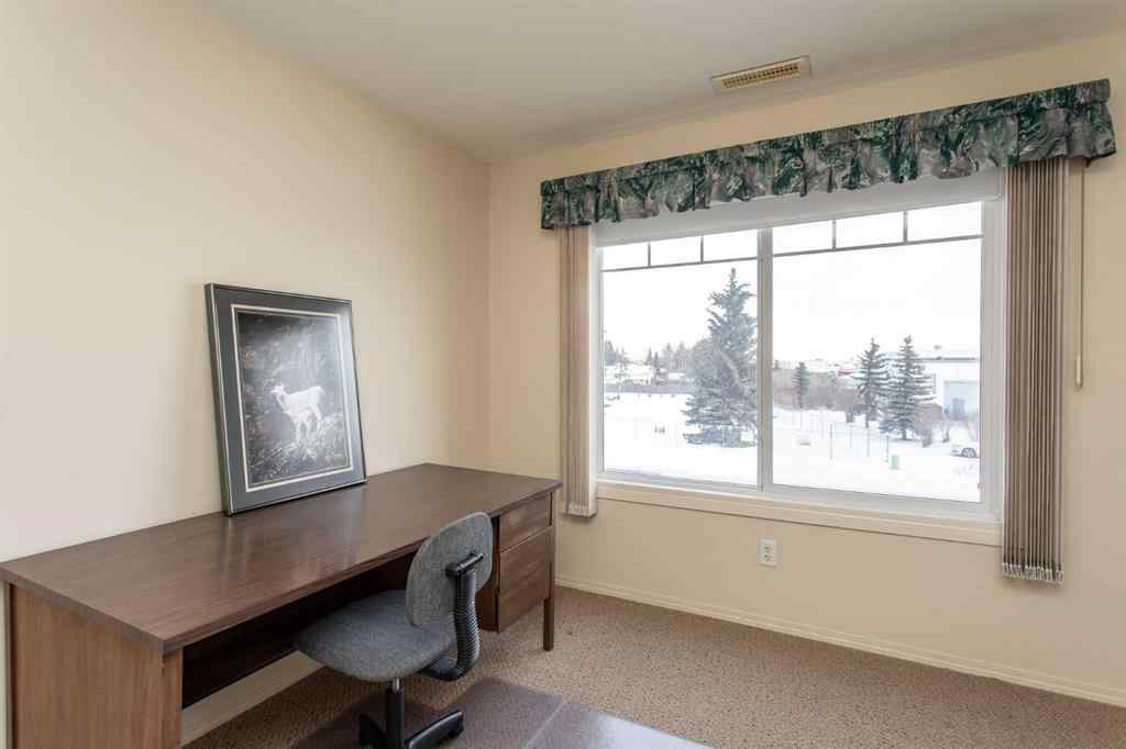 MLS® A2260347 - Unit #207 4425 Heritage Way   in Downtown Lacombe Lacombe, Residential