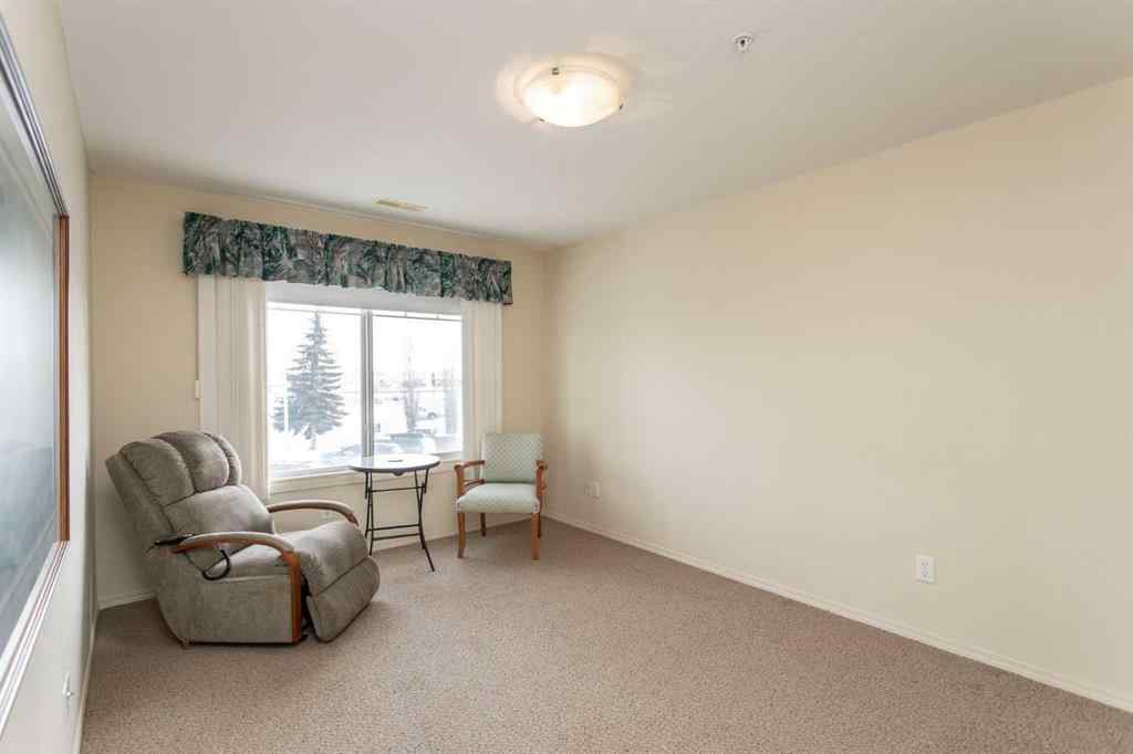 MLS® A2260347 - Unit #207 4425 Heritage Way   in Downtown Lacombe Lacombe, Residential