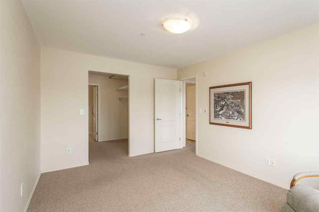 MLS® A2260347 - Unit #207 4425 Heritage Way   in Downtown Lacombe Lacombe, Residential