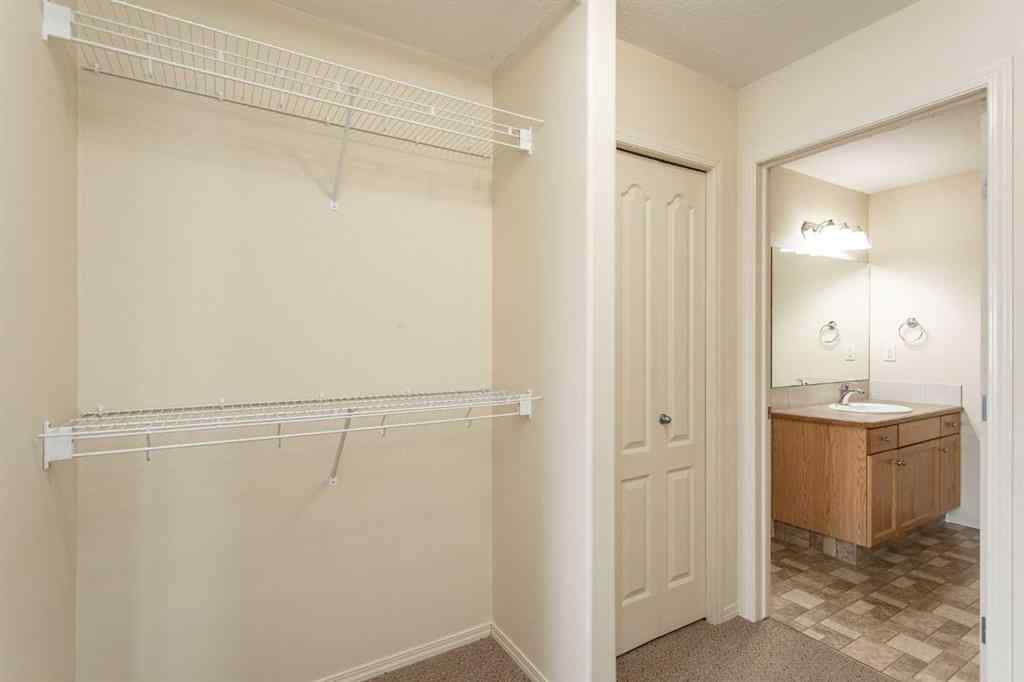 MLS® A2260347 - Unit #207 4425 Heritage Way   in Downtown Lacombe Lacombe, Residential