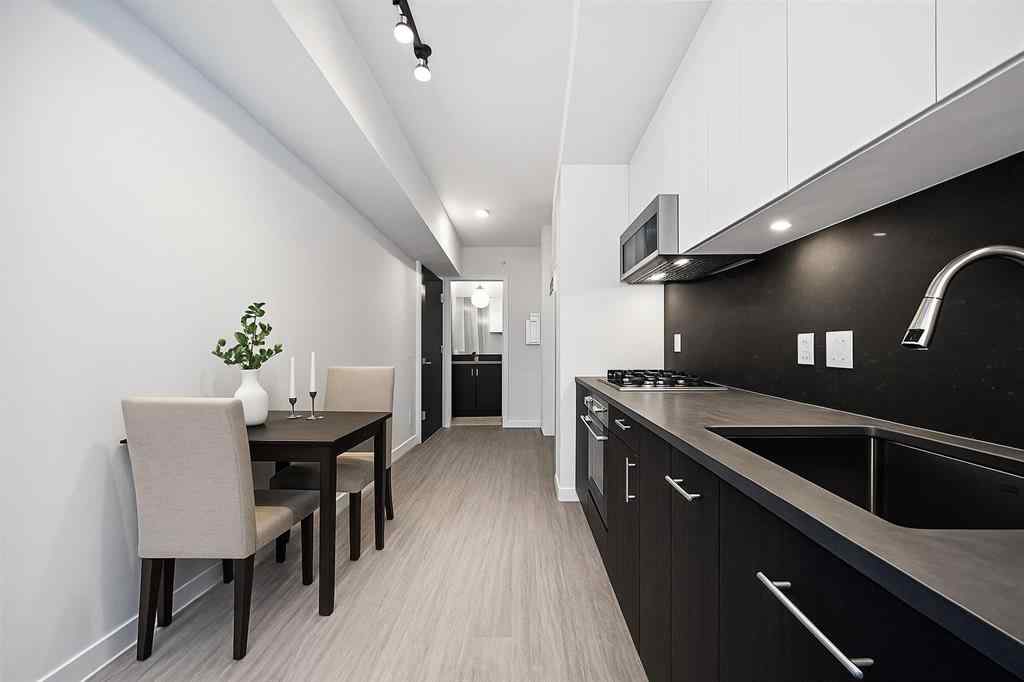 MLS® A2260365 - Unit #704 730 2 Avenue SW in Eau Claire Calgary, Residential