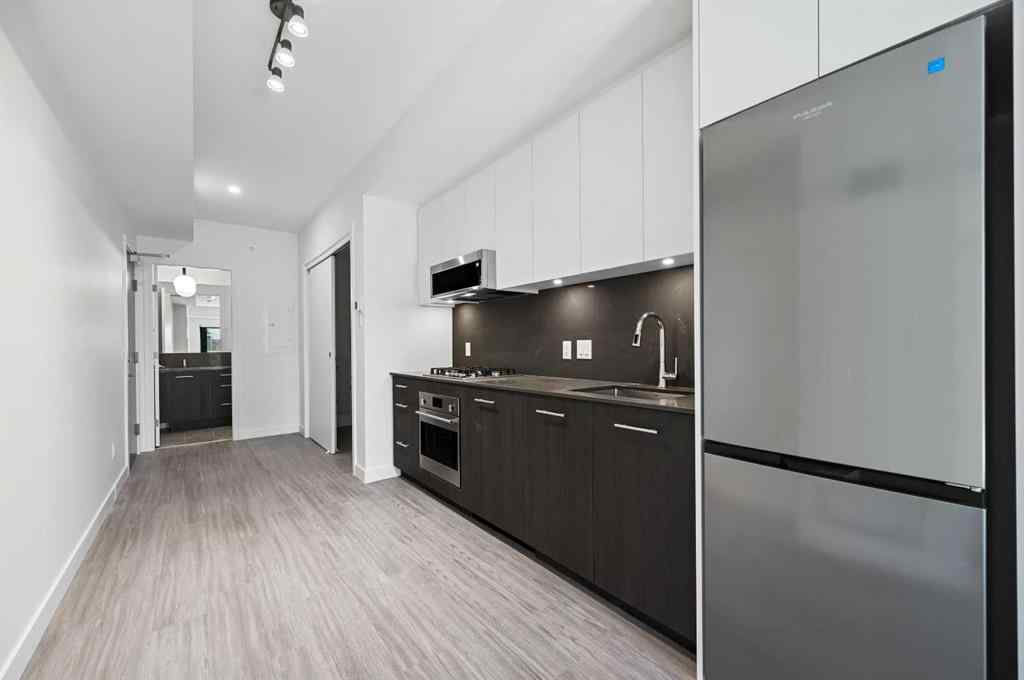 MLS® A2260365 - Unit #704 730 2 Avenue SW in Eau Claire Calgary, Residential