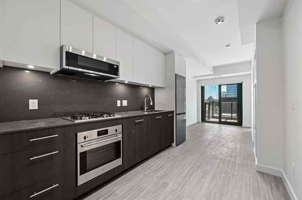 MLS® A2260365 - Unit #704 730 2 Avenue SW in Eau Claire Calgary, Residential