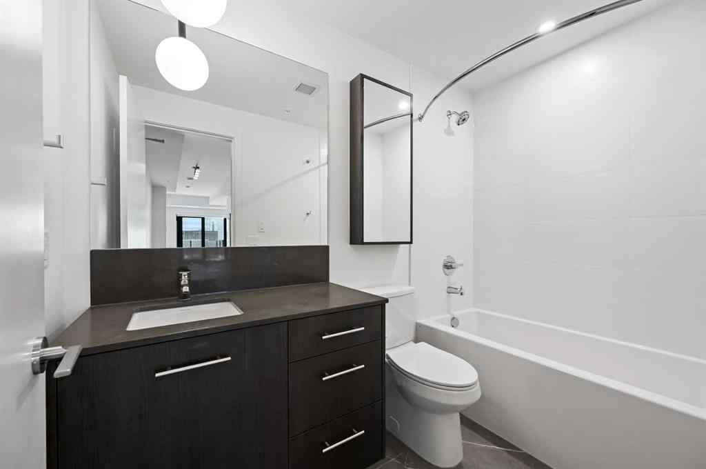 MLS® A2260365 - Unit #704 730 2 Avenue SW in Eau Claire Calgary, Residential