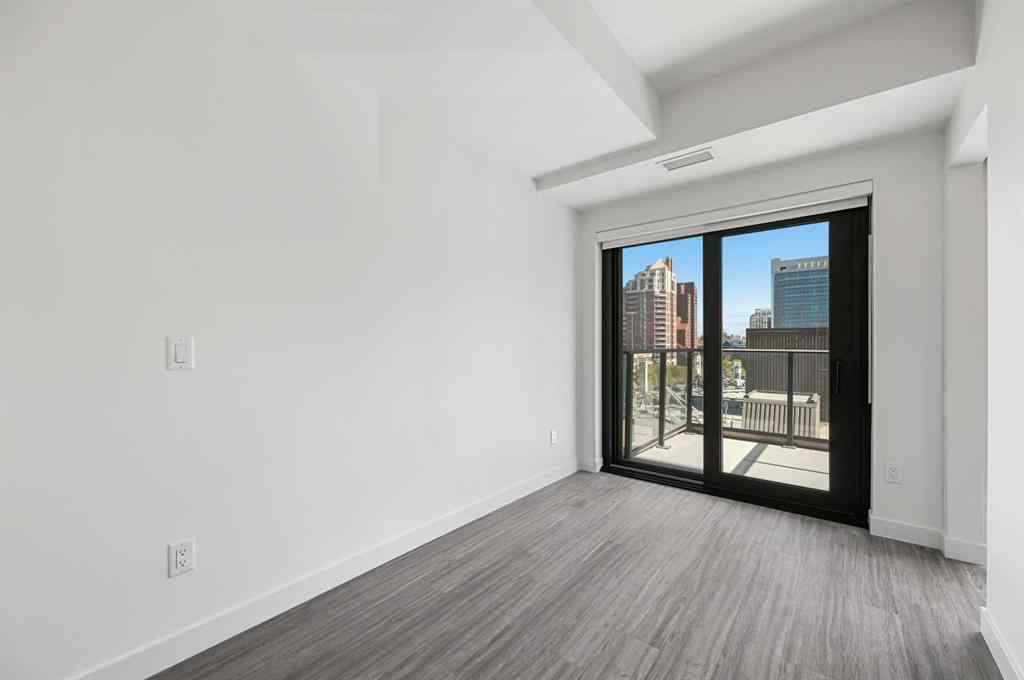 MLS® A2260365 - Unit #704 730 2 Avenue SW in Eau Claire Calgary, Residential