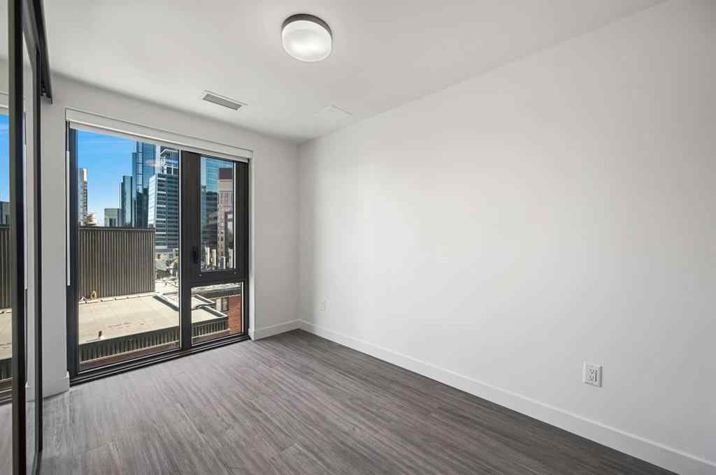 MLS® A2260365 - Unit #704 730 2 Avenue SW in Eau Claire Calgary, Residential