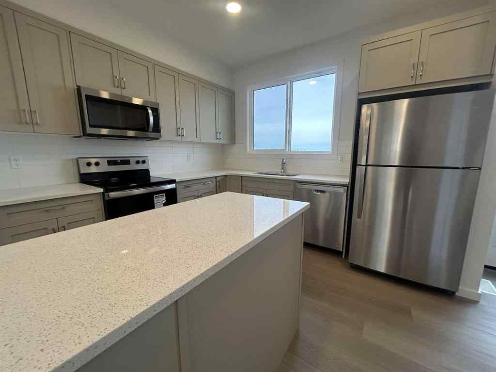 MLS® A2260419 - 200 Belmont Way SW in Belmont Calgary, Residential