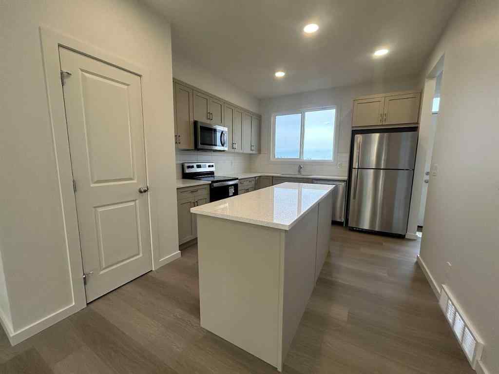 MLS® A2260419 - 200 Belmont Way SW in Belmont Calgary, Residential