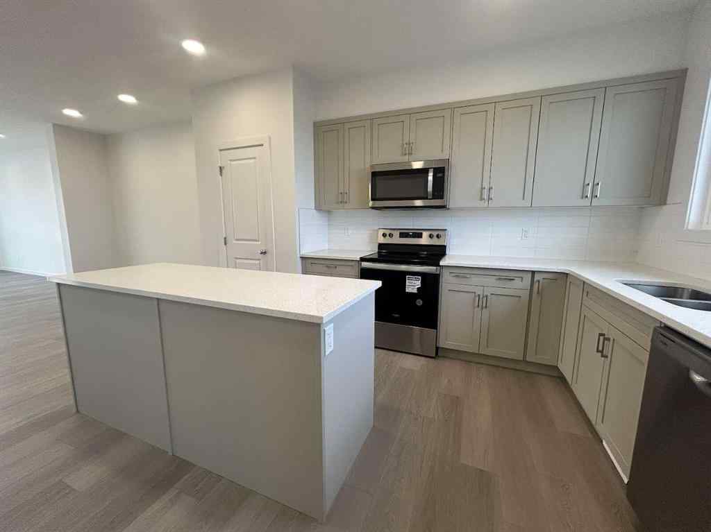 MLS® A2260419 - 200 Belmont Way SW in Belmont Calgary, Residential