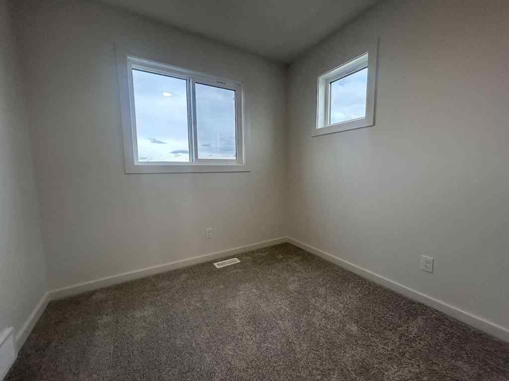 MLS® A2260419 - 200 Belmont Way SW in Belmont Calgary, Residential