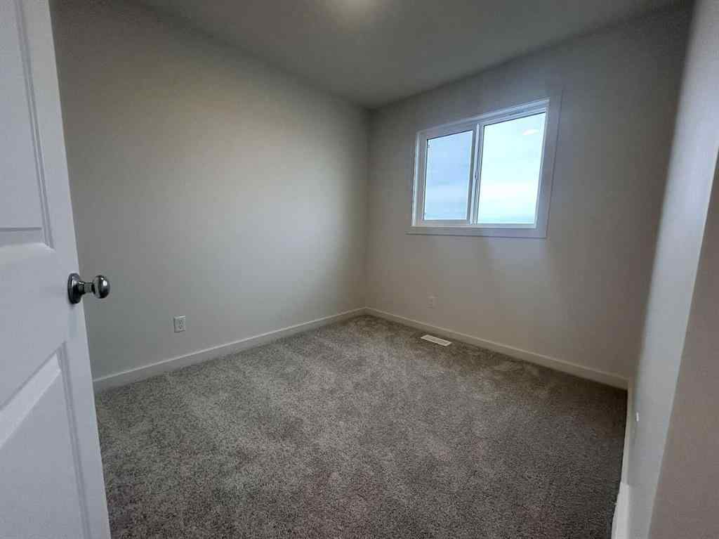 MLS® A2260419 - 200 Belmont Way SW in Belmont Calgary, Residential