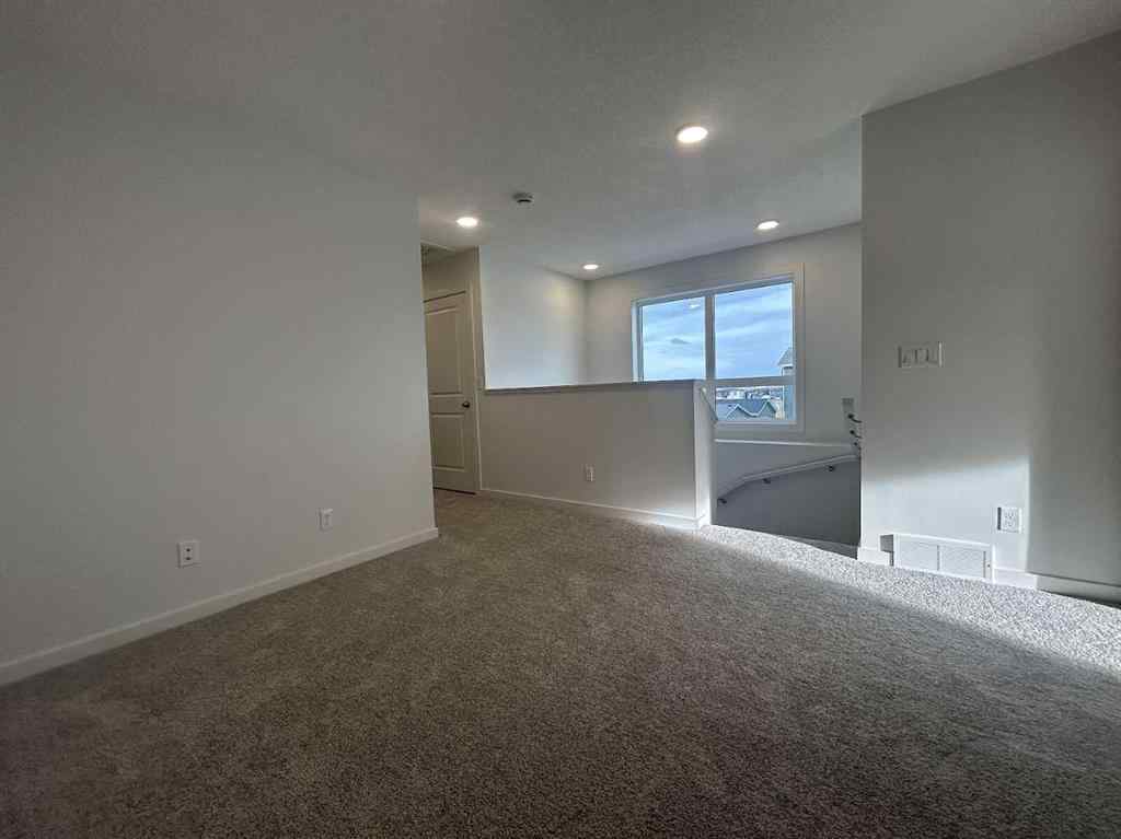MLS® A2260419 - 200 Belmont Way SW in Belmont Calgary, Residential