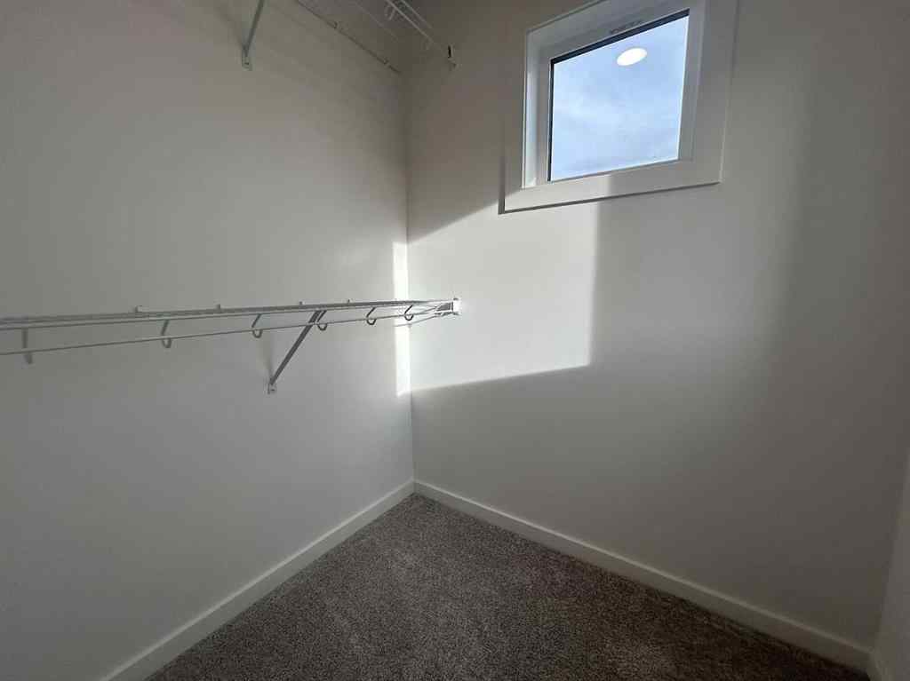 MLS® A2260419 - 200 Belmont Way SW in Belmont Calgary, Residential