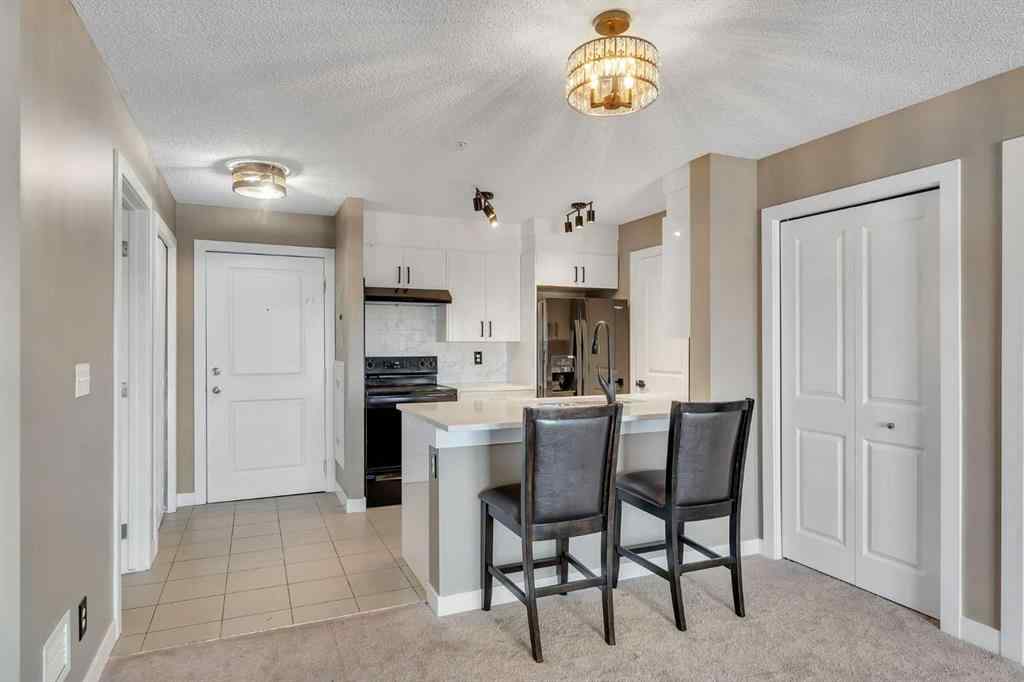 MLS® A2260422 - Unit #415 5 Saddlestone Way NE in Saddle Ridge Calgary, Residential