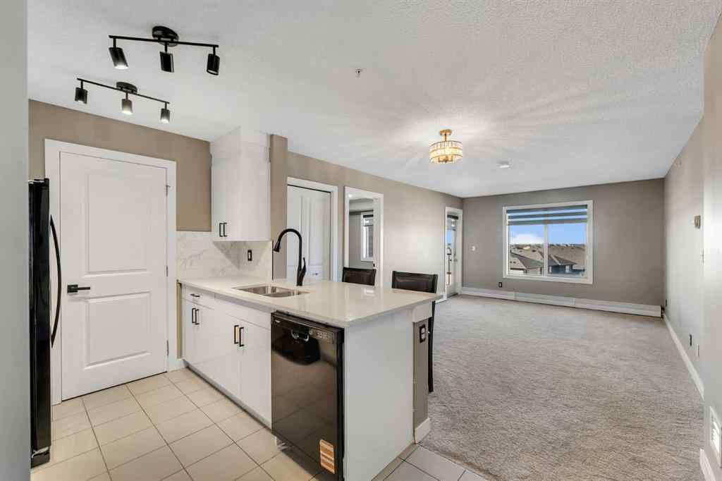 MLS® A2260422 - Unit #415 5 Saddlestone Way NE in Saddle Ridge Calgary, Residential
