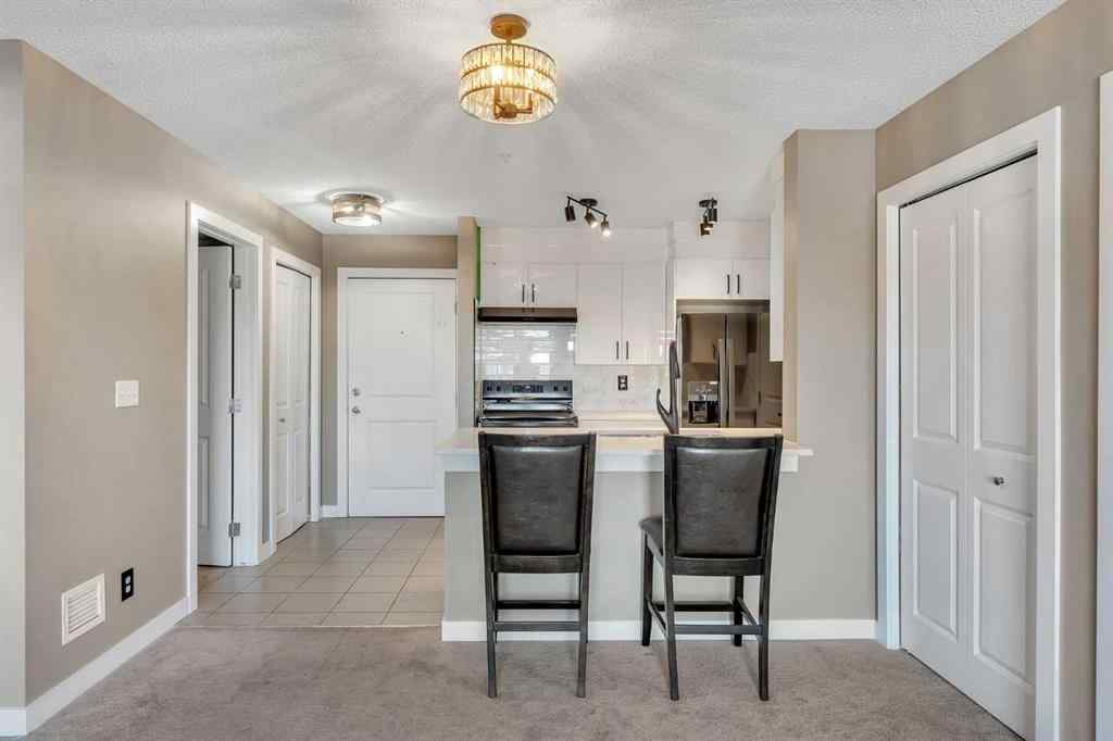 MLS® A2260422 - Unit #415 5 Saddlestone Way NE in Saddle Ridge Calgary, Residential