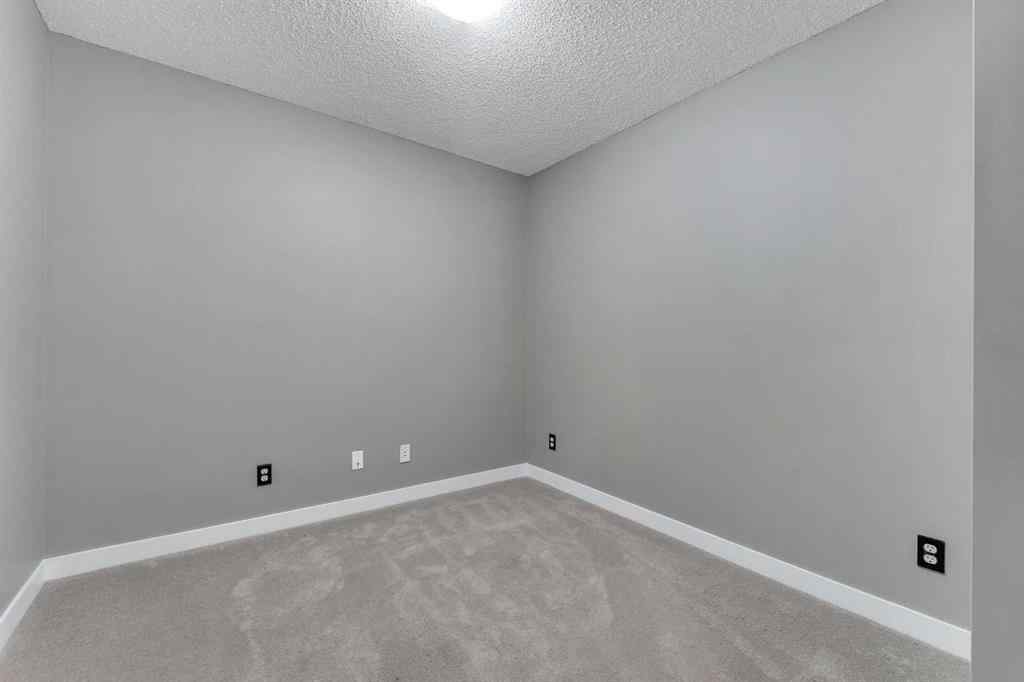 MLS® A2260422 - Unit #415 5 Saddlestone Way NE in Saddle Ridge Calgary, Residential