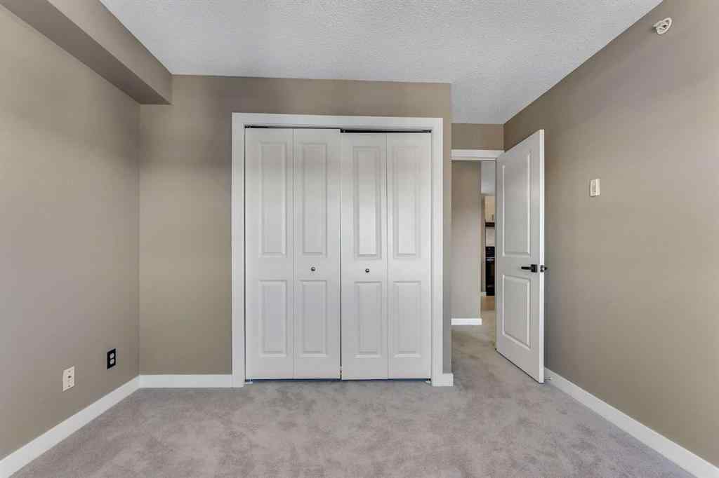 MLS® A2260422 - Unit #415 5 Saddlestone Way NE in Saddle Ridge Calgary, Residential