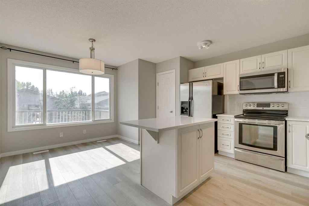 MLS® A2260432 - 1931 Reunion Boulevard NW in Reunion Airdrie, Residential