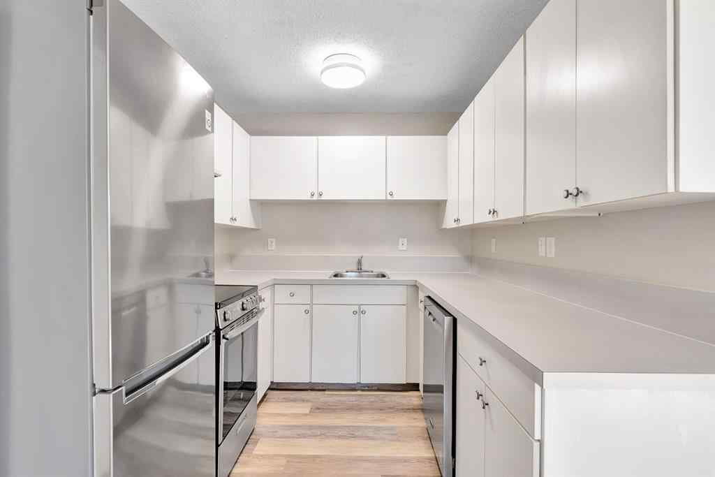 MLS® A2260451 - Unit #407D 5601 Dalton Drive NW in Dalhousie Calgary, Residential