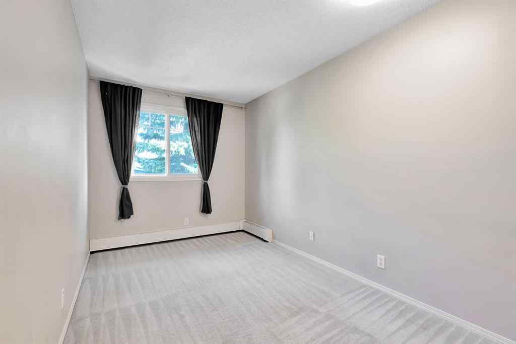 MLS® A2260451 - Unit #407D 5601 Dalton Drive NW in Dalhousie Calgary, Residential