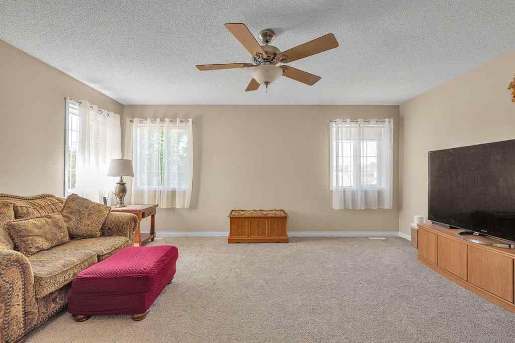 MLS® A2260452 - 320 Evermeadow Road SW in Evergreen Calgary, Residential