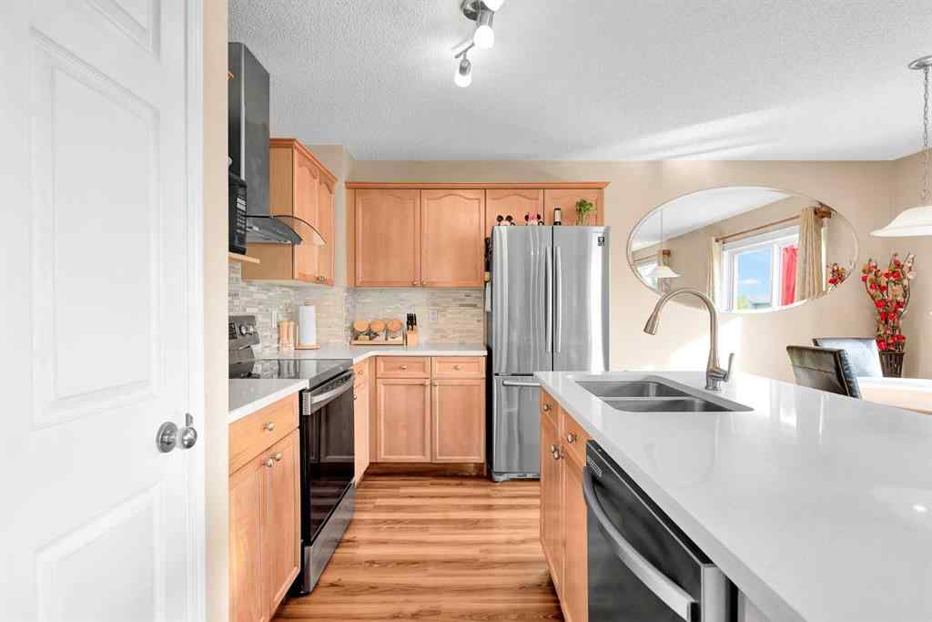 MLS® A2260452 - 320 Evermeadow Road SW in Evergreen Calgary, Residential