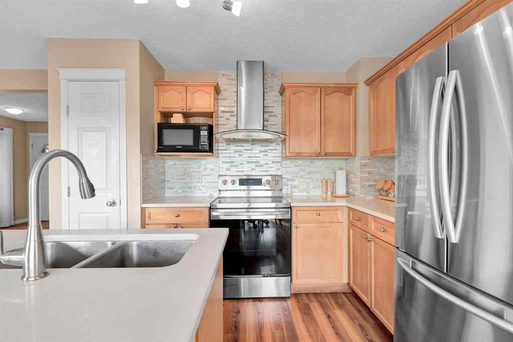 MLS® A2260452 - 320 Evermeadow Road SW in Evergreen Calgary, Residential