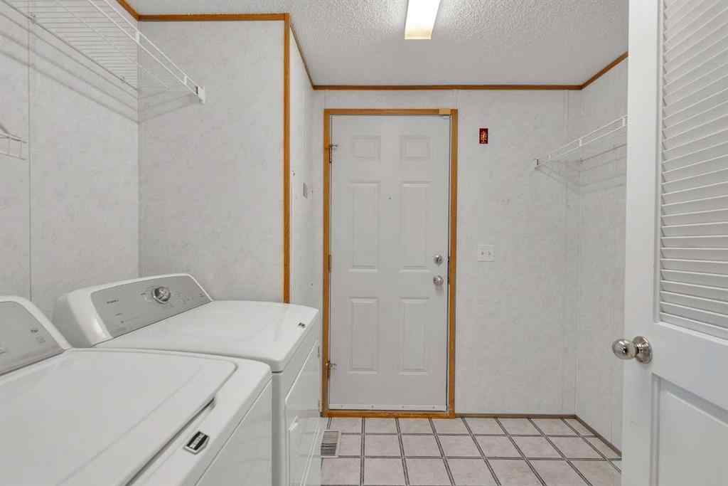 MLS® A2260469 - 211 2 Avenue SE in NONE Diamond Valley, Mobile