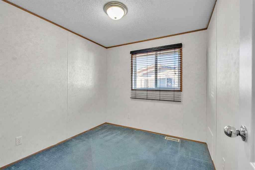 MLS® A2260469 - 211 2 Avenue SE in NONE Diamond Valley, Mobile