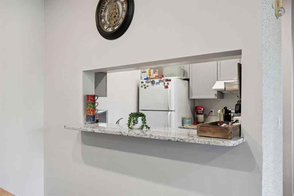 MLS® A2260470 - Unit #316 2022 Canyon Meadows Drive SE in Queensland Calgary, Residential