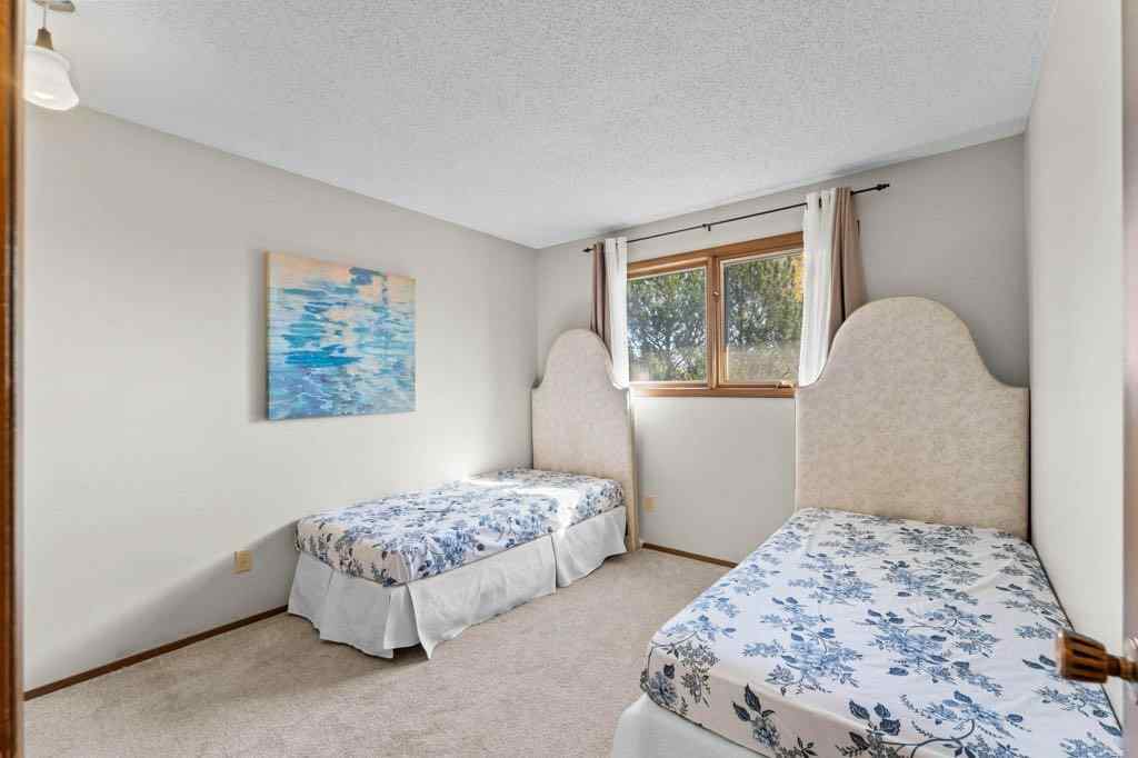 MLS® A2260483 - 47 Woodmont Way SW in Woodbine Calgary, Residential