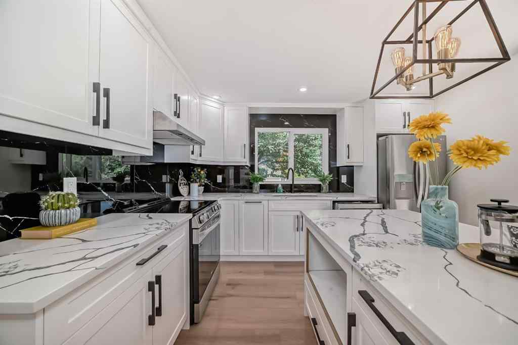 MLS® A2260488 - 128 Cantrell Place SW in Canyon Meadows Calgary, Residential