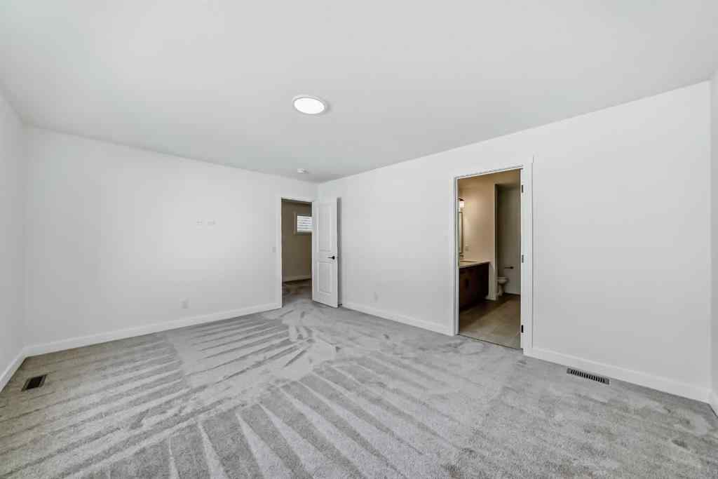 MLS® A2260490 - 39 Bartlett Row SE in Rangeview Calgary, Residential