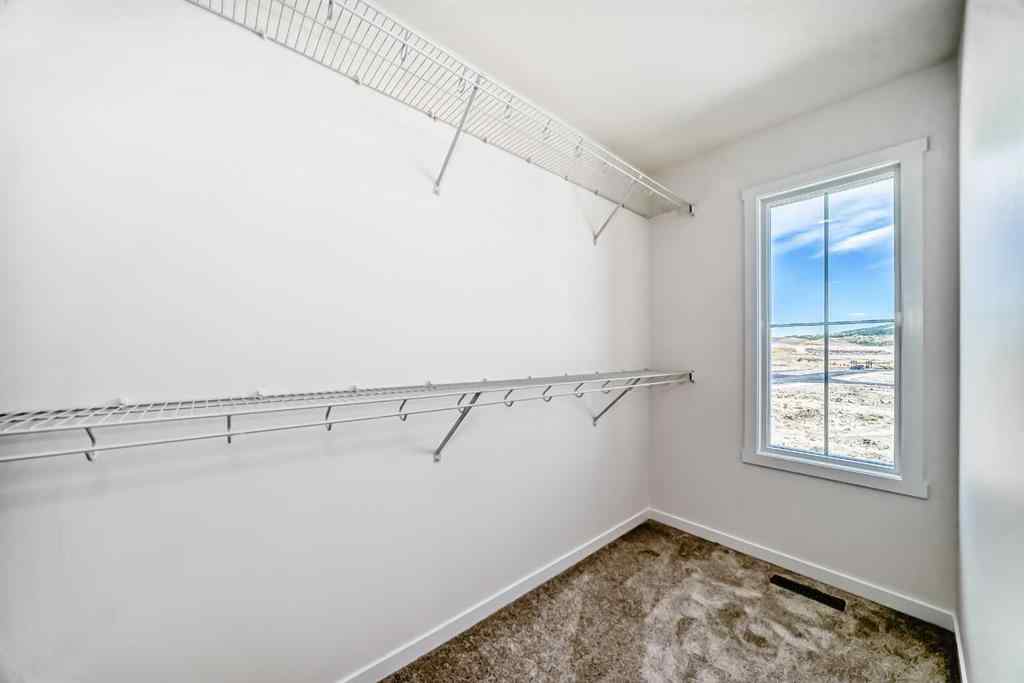 MLS® A2260501 - 158 Appaloosa Crescent  in Heartland Cochrane, Residential