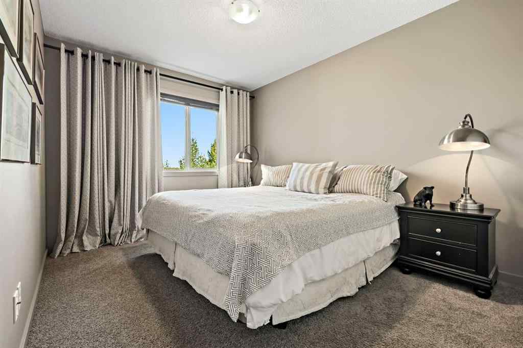 MLS® A2260504 - 590 River Heights Crescent  in River Song Cochrane, Residential