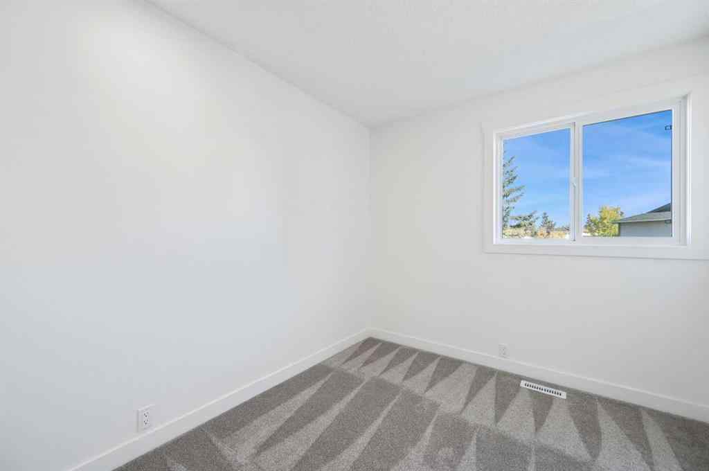 MLS® A2260505 - Unit #4 220 Erin Mount Crescent SE in Erin Woods Calgary, Residential