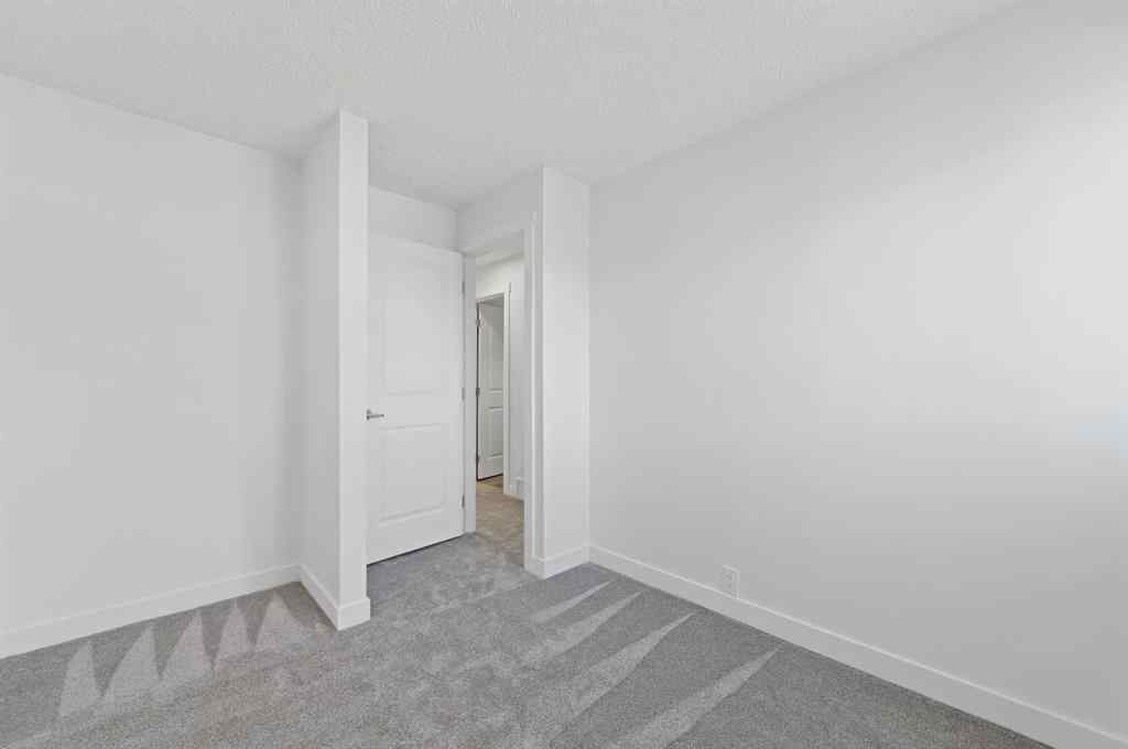 MLS® A2260505 - Unit #4 220 Erin Mount Crescent SE in Erin Woods Calgary, Residential