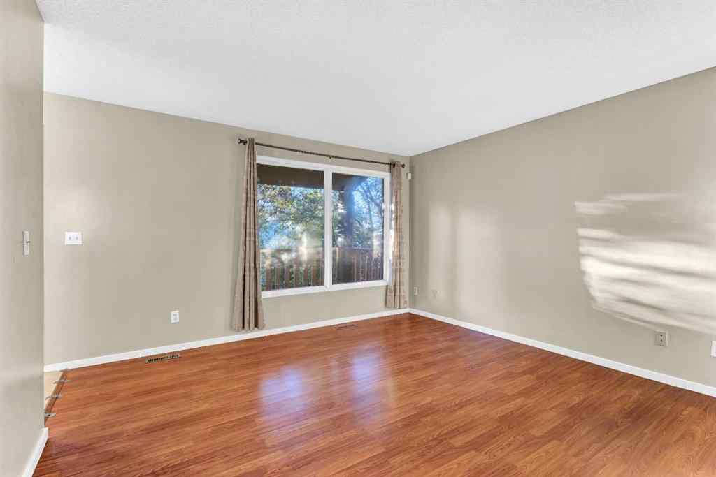 MLS® A2260534 - 116 Shawmeadows Road SW in Shawnessy Calgary, Residential