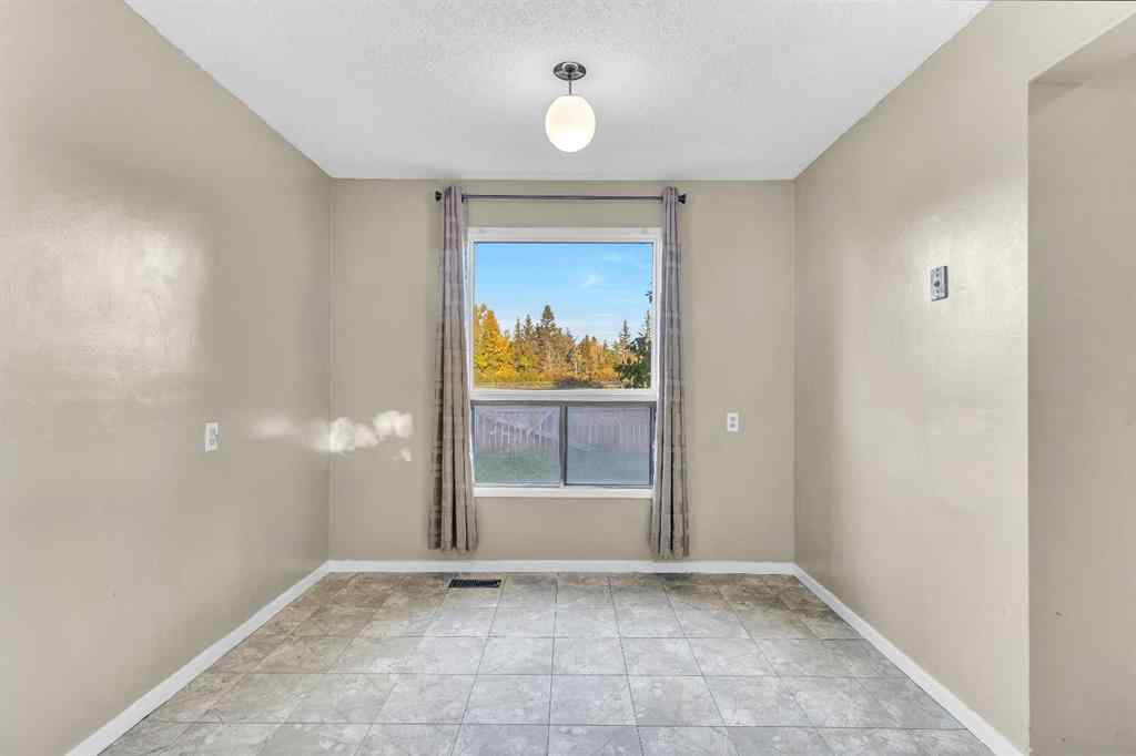 MLS® A2260534 - 116 Shawmeadows Road SW in Shawnessy Calgary, Residential