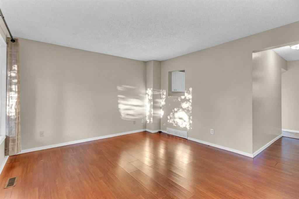 MLS® A2260534 - 116 Shawmeadows Road SW in Shawnessy Calgary, Residential