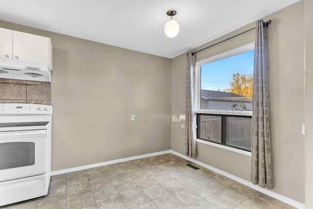 MLS® A2260534 - 116 Shawmeadows Road SW in Shawnessy Calgary, Residential
