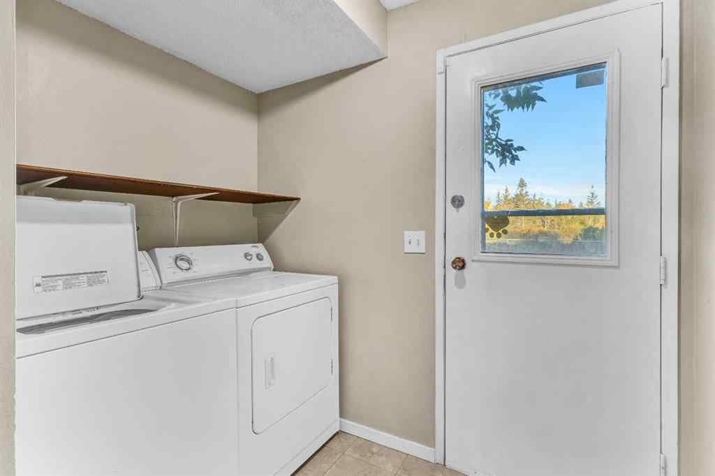 MLS® A2260534 - 116 Shawmeadows Road SW in Shawnessy Calgary, Residential