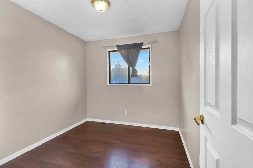MLS® A2260534 - 116 Shawmeadows Road SW in Shawnessy Calgary, Residential
