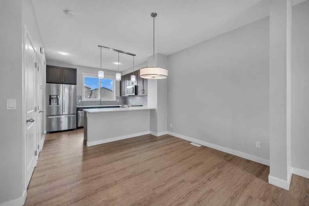 MLS® A2260573 - 14878 1 Street NE in Livingston Calgary, Residential