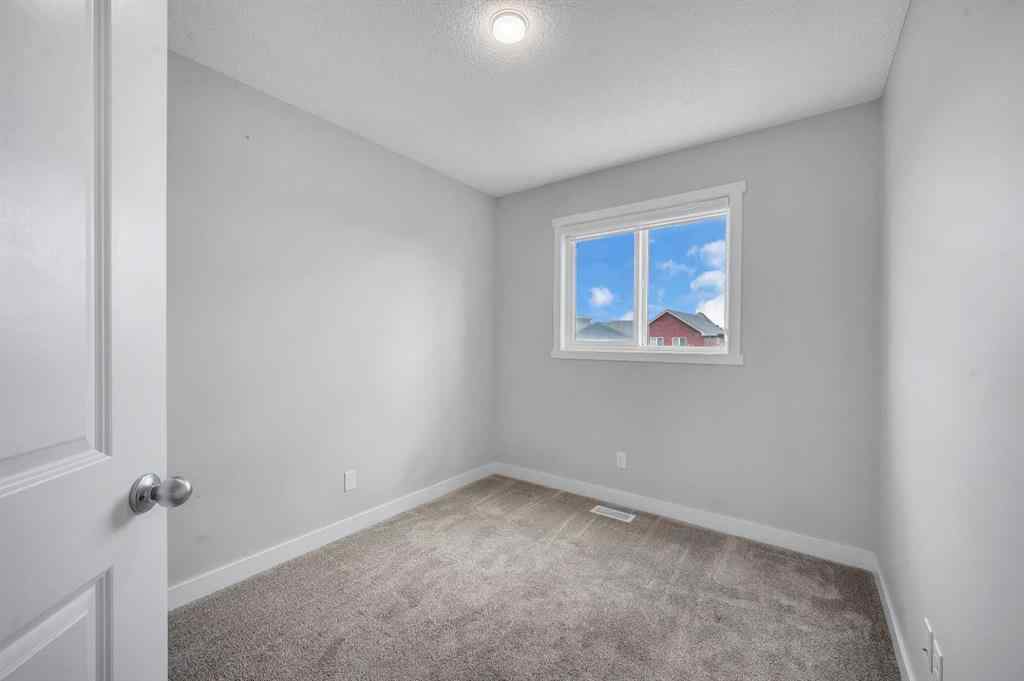 MLS® A2260573 - 14878 1 Street NE in Livingston Calgary, Residential