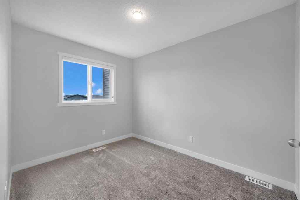 MLS® A2260573 - 14878 1 Street NE in Livingston Calgary, Residential