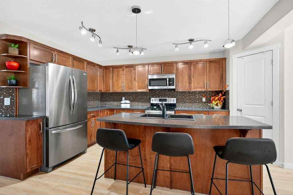 MLS® A2260600 - 1346 Kings Heights Way SE in Kings Heights Airdrie, Residential